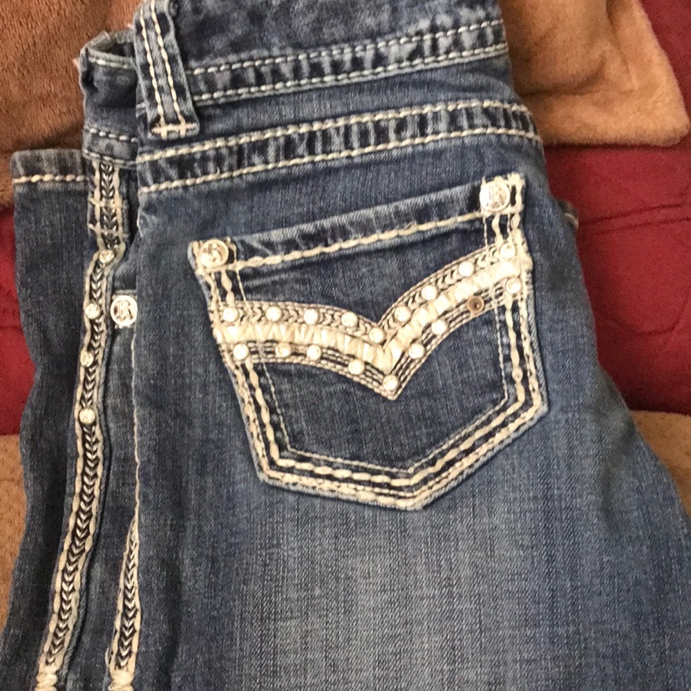 Rock and roll cowgirl jeans.